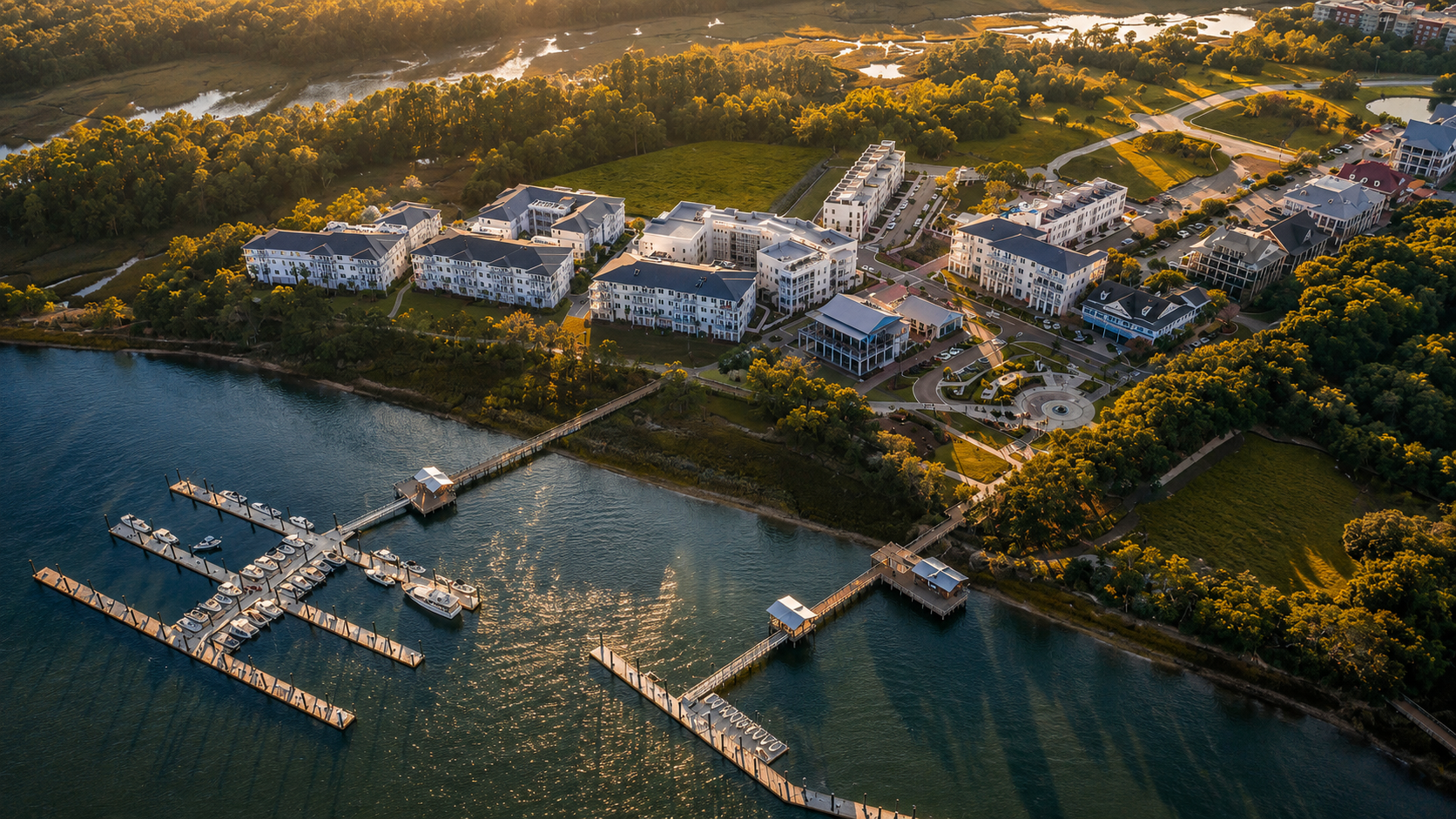 Aerial view of waterfront homes, marina, and marsh on Daniel Island near Charleston, South Carolina